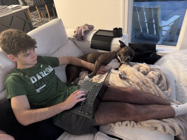 Working on Cancer Kicks with help from our dog