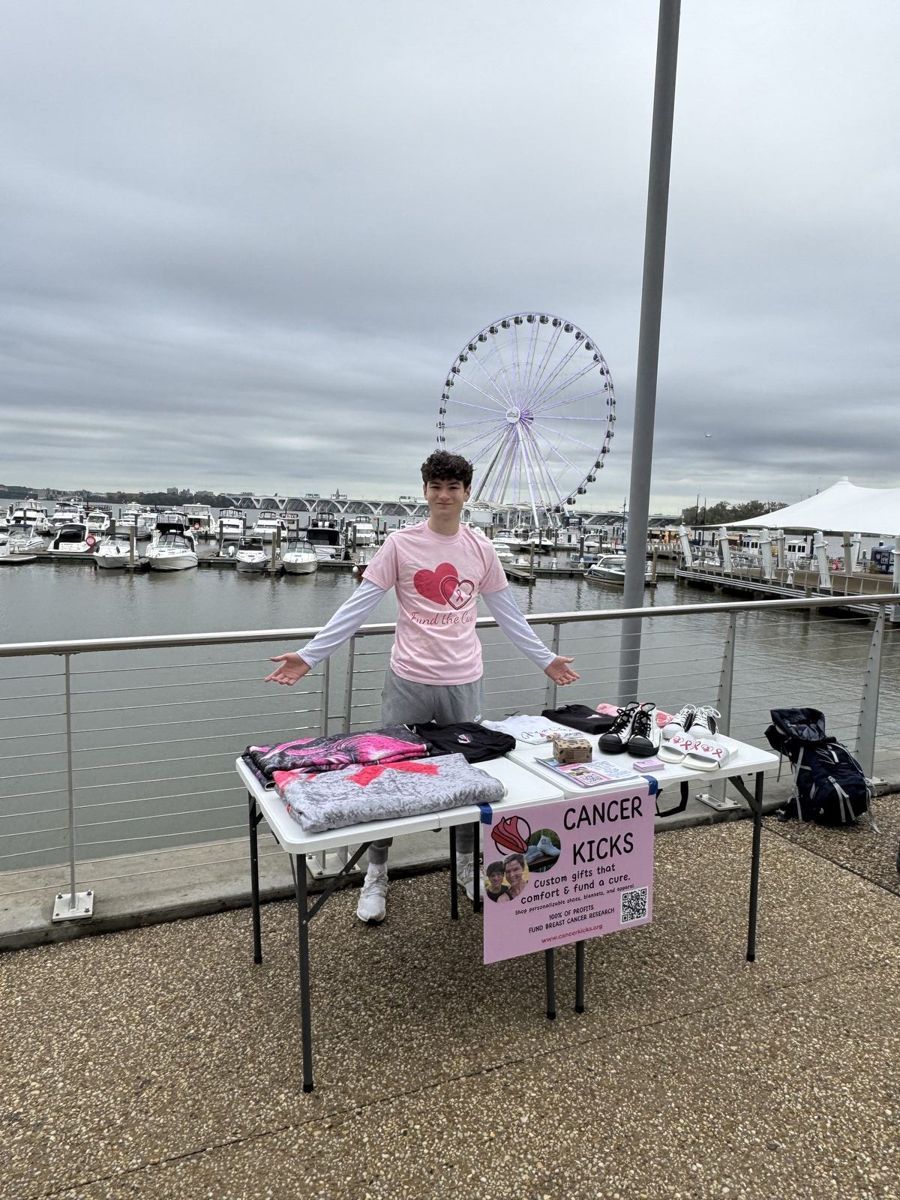 Owen promoting Cancer Kicks at an event