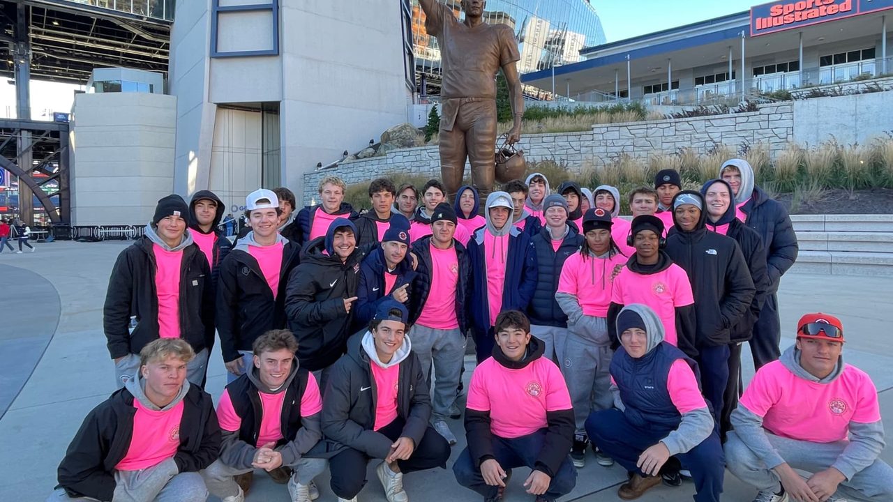 In partnership with the Pink Lemonade Stand Challenge, the Masters School baseball team staffed a pink lemonade stand at Gillette Stadium.